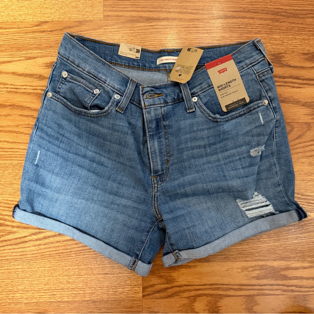 Levi's Women's Medium Blue Rolled-Hem Denim Shorts, mid rise and mid length